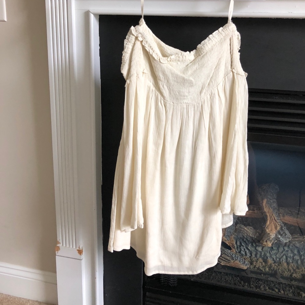 Cream off the shoulder dress.
